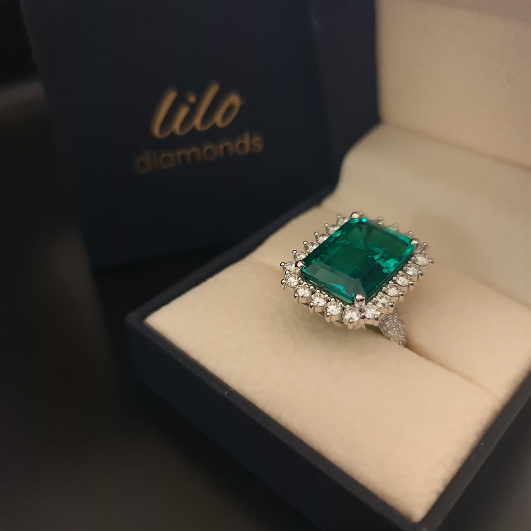 Oasis -10.72 carat emerald ring with 2.10 carat natural diamonds