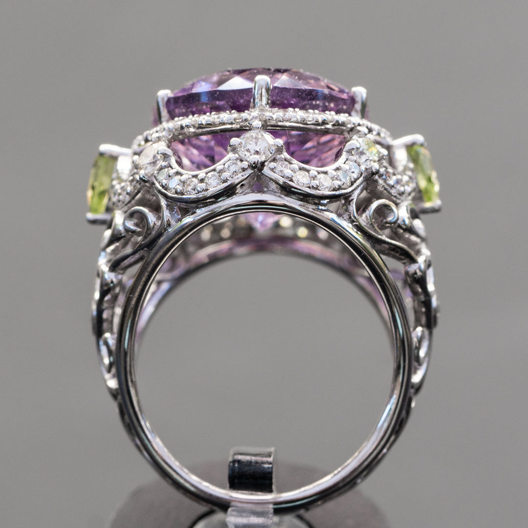 Zoey - 16.00 carat oval amethyst ring with 1.51 carat natural diamonds