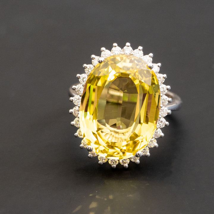 Carole - 21.00 carat oval yellow sapphire ring with 1.00 carat natural diamonds