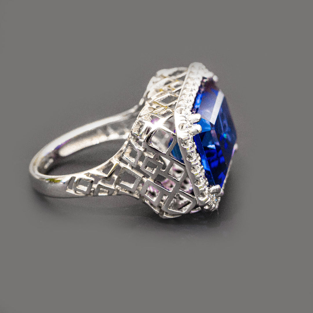 Anelise - 22.00 carat emerald sapphire ring with 0.70 carat natural diamonds