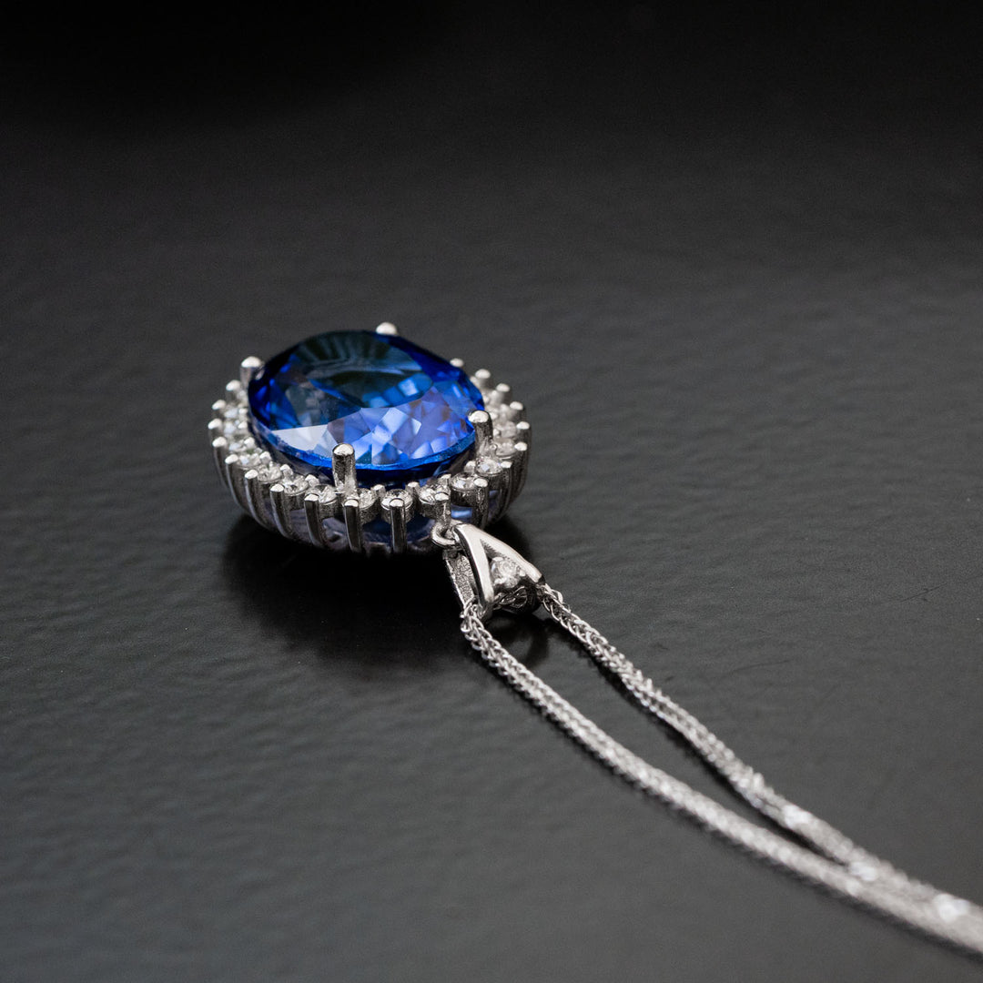 Angela - 15.00 carat oval sapphire pendant with 0.62 carat natural diamonds