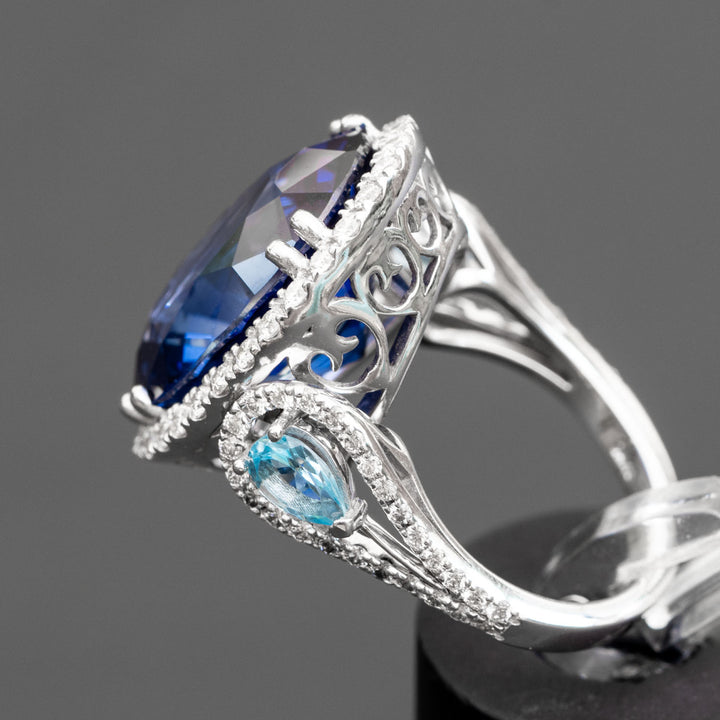 Ninette - 27.28 carat oval sapphire & topaz ring with 1.04 carat natural diamonds