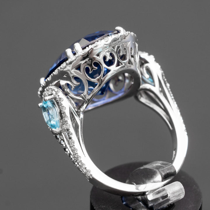 Ninette - 27.28 carat oval sapphire & topaz ring with 1.04 carat natural diamonds