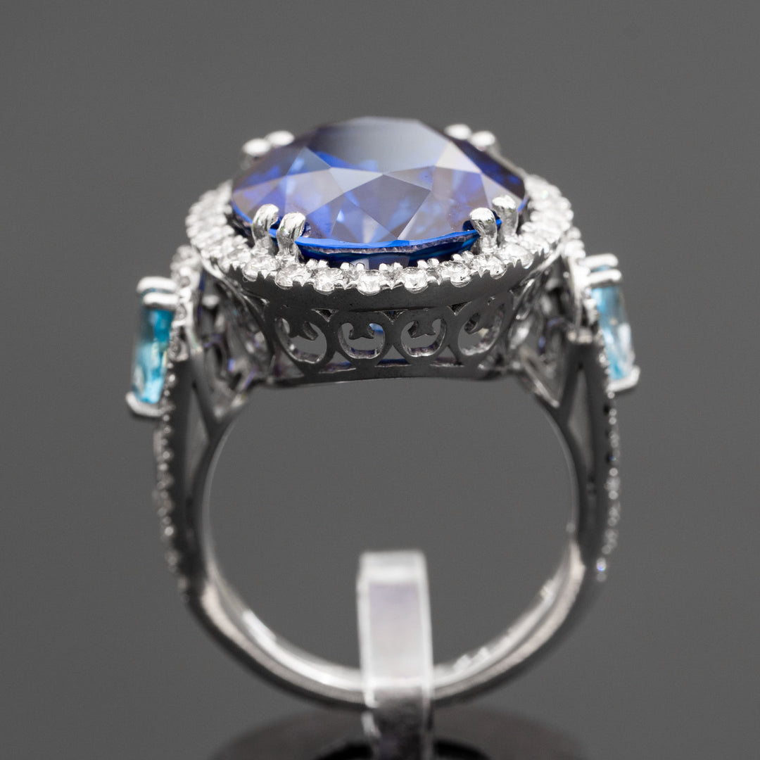 Ninette - 27.28 carat oval sapphire & topaz ring with 1.04 carat natural diamonds