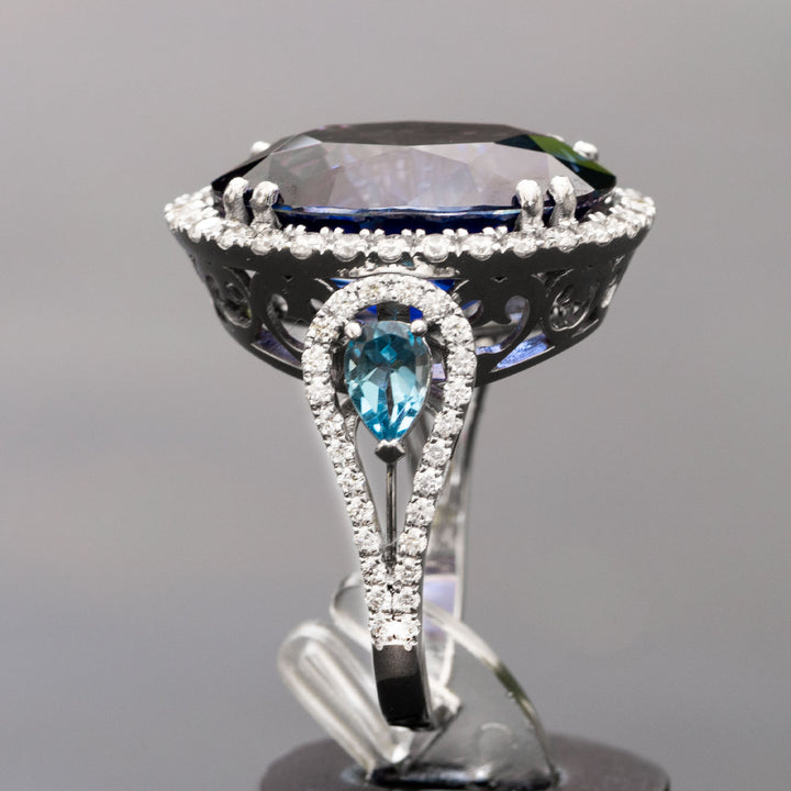 Ninette - 27.28 carat oval sapphire & topaz ring with 1.04 carat natural diamonds