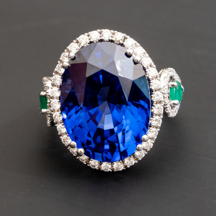 Adalene - 27.28 carat oval sapphire ring with 1.04 carat natural diamonds