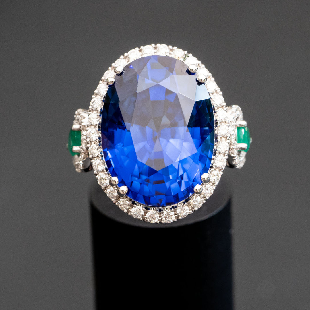 Adalene - 27.28 carat oval sapphire ring with 1.04 carat natural diamonds