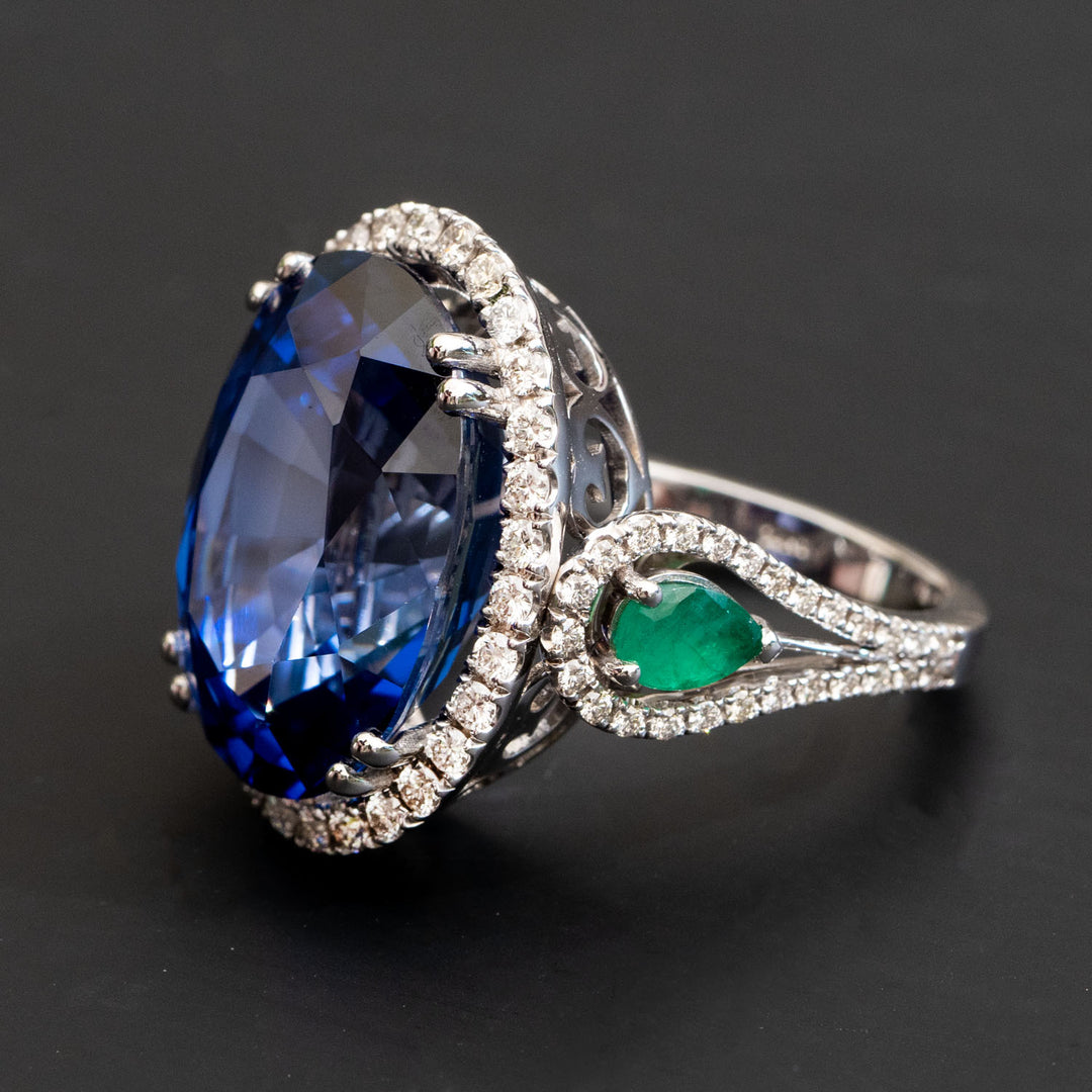 Adalene - 27.28 carat oval sapphire ring with 1.04 carat natural diamonds