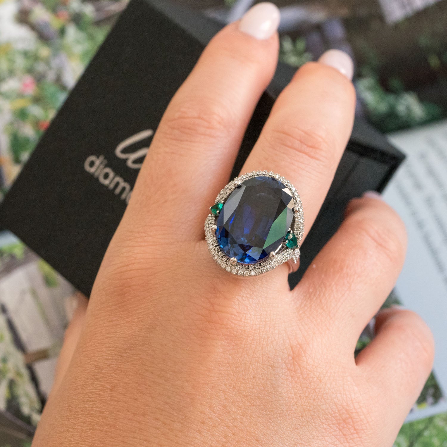 Cecile 24.00 carat sapphire ring with 0.82 carat natural diamonds