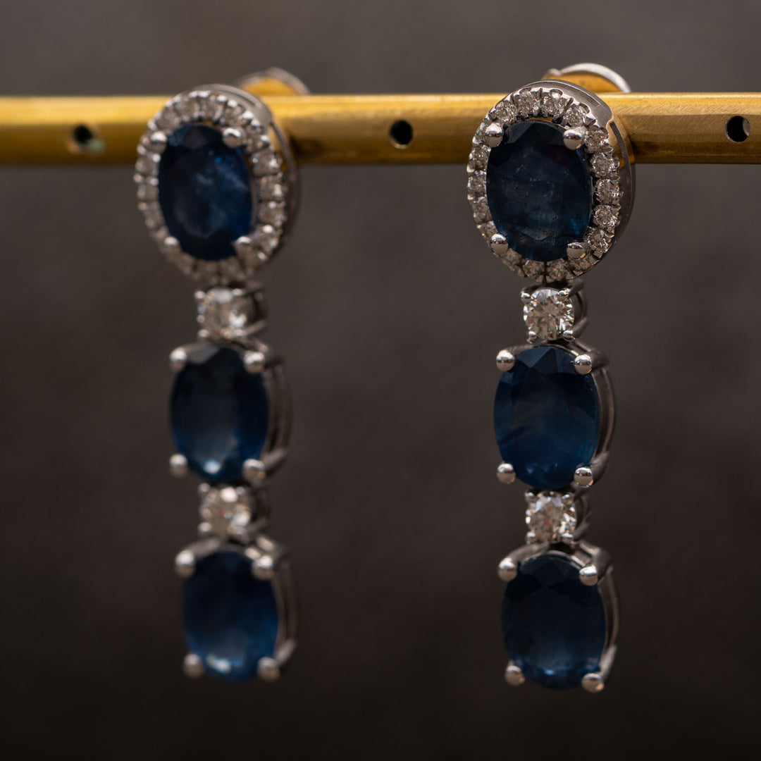 Aymelina - 9.35 carat oval sapphire earrings with 0.69 carat natural diamonds