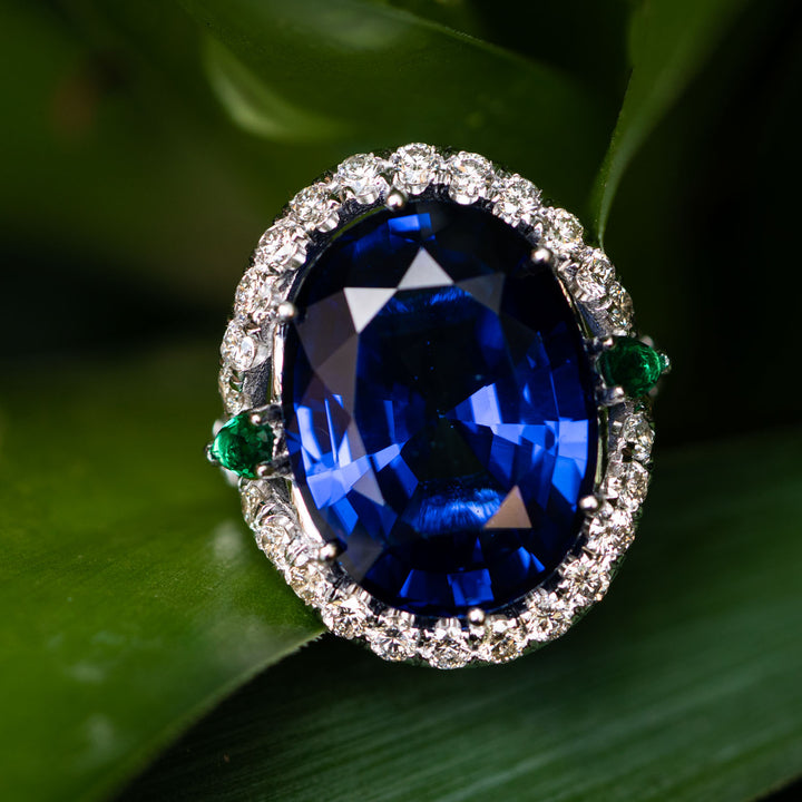 Juliana - 25.00 ct oval sapphire ring with 0.30 natural green emeralds and 1.10 carat natural diamonds