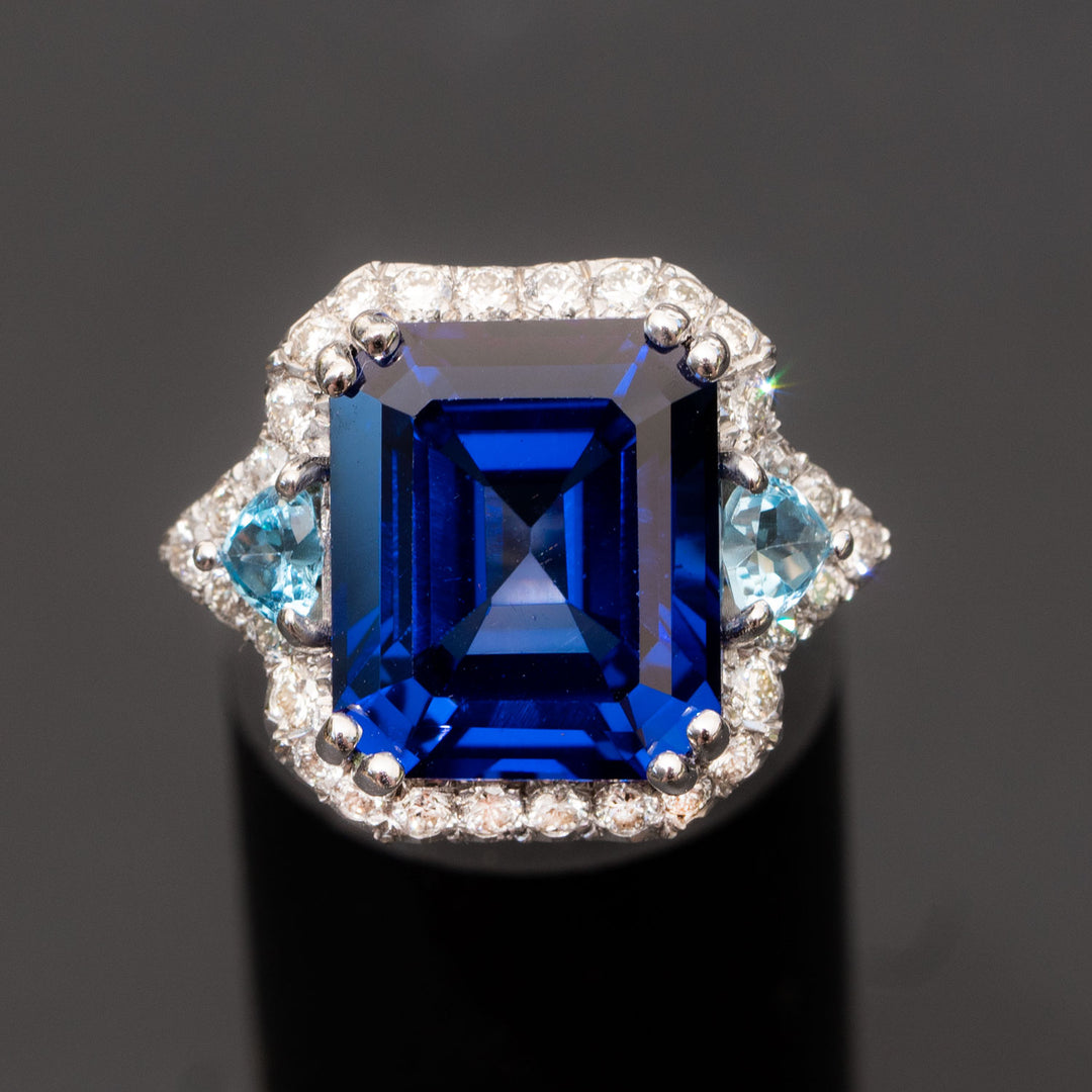 Suzanne - 13.18 carat sapphire ring with 0.80 carat natural diamonds & 0.70 carat topaz